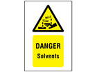 Danger solvents symbol and text safety sign.