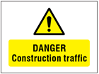 Danger Construction traffic symbol and text safety sign.