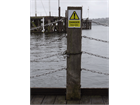 Caution, Deep water symbol and text safety sign.