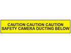 Caution safety camera ducting below tape.