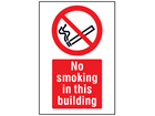 No smoking in this building symbol and text safety sign.