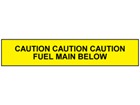 Caution fuel main below tape.