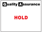 Hold quality assurance label.