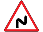 Double bend first to the right sign