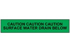 Caution surface water drain below tape.