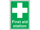 First aid station symbol and text safety sign.