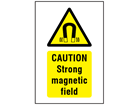 Caution Strong magnetic field symbol and text safety sign.