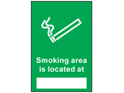 Smoking area is located sign