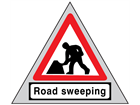 Men at work, road sweeping roll up road sign