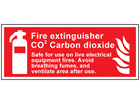 Fire extinguisher CO2 carbon dioxide Safe for use on live electrical equipment symbol & text safety sign.