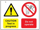 Caution test in progress, do not operate safety sign.