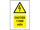 Caution 11000 volts symbol and text safety sign.