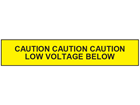 Caution low voltage below tape.