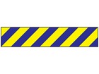 Laminated warning tape, blue and yellow chevron.