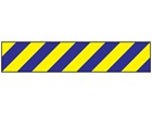 Laminated warning tape, blue and yellow chevron.