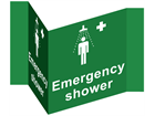 Emergency shower projecting safety sign.