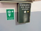 Emergency eye wash symbol and text sign.