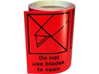 Do not use blades to open transit label