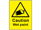 Caution wet paint sign.