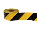 Heavy duty barrier tape, black and yellow chevron.