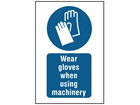 Wear gloves when using machinery symbol and text safety sign.