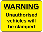 Warning Unauthorised vehicles will be clamped sign