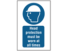 Head protection must be worn at all times symbol and text safety sign.