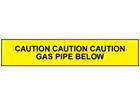 Caution gas pipe below tape.