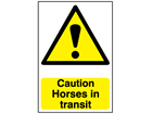 Caution Horses in transit safety sign.