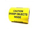 Caution sharp objects inside labels