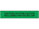 Caution reclaimed water below tape.