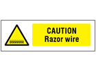 Caution Razor wire safety sign.