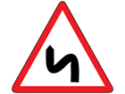 Double bend first to the left sign