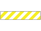 Yellow and white striped flagging tape