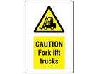 Caution Fork lift trucks symbol and text safety sign.