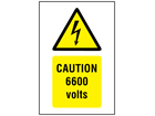 Caution 6600 volts symbol and text safety sign.
