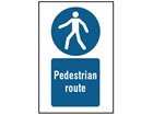 Pedestrian route symbol and text safety sign.