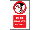 Do not wash with solvents symbol and text safety sign.