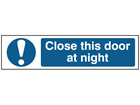 Close this door at night, mini safety sign.