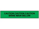 Caution brine main below tape.