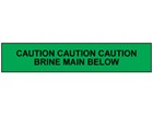 Caution brine main below tape.
