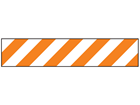 Orange and white striped flagging tape