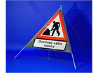 Overhead cable repairs roll up road sign