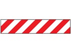 Laminated warning tape, red and white chevron.