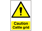 Caution cattle grid safety sign.