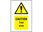 Caution Test area symbol and text safety sign.