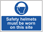 Safety helmets must be worn on this site sign