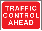 Traffic control ahead temporary road sign.