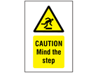 Caution, Mind the step symbol and text safety sign.