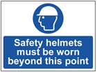 Safety helmets must be worn beyond this point sign